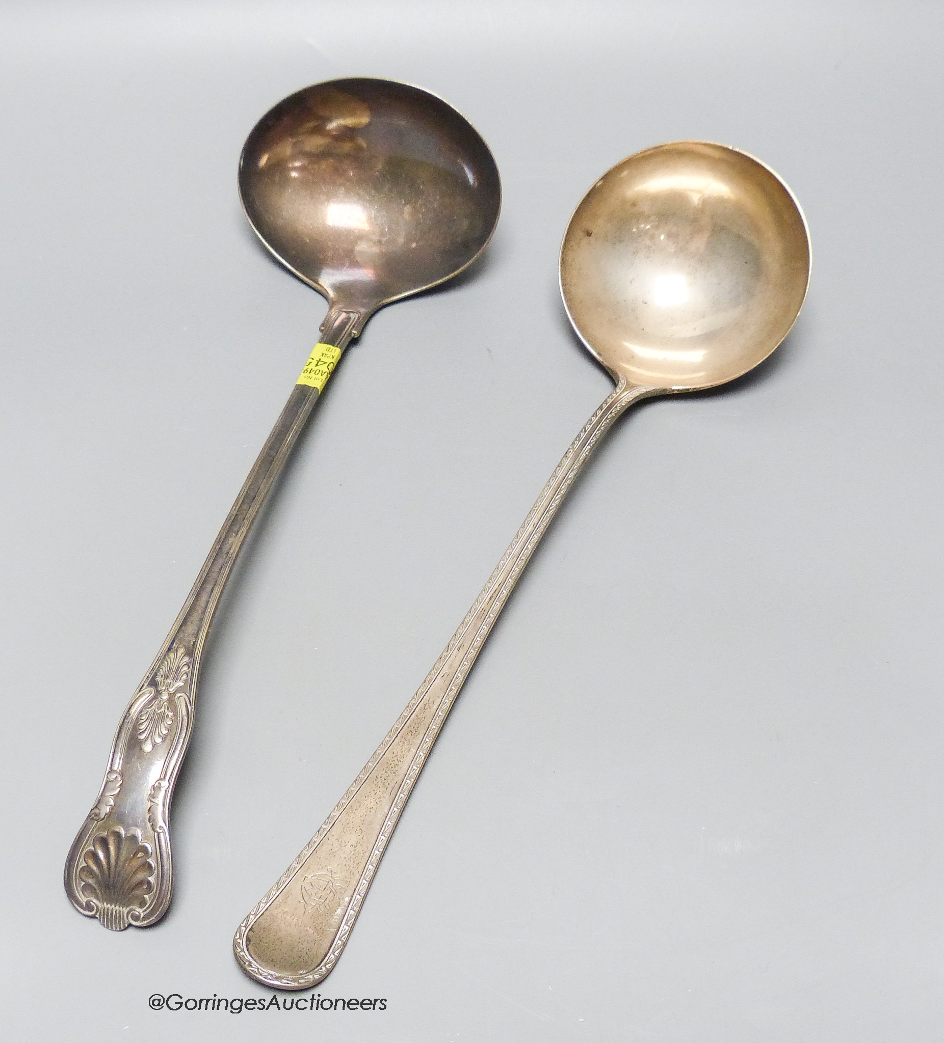 A late Victorian silver Old English pattern soup pattern, Frederick Elkington, Birmingham, 1878, 34.1cm, 259 grams and a plated soup ladle.